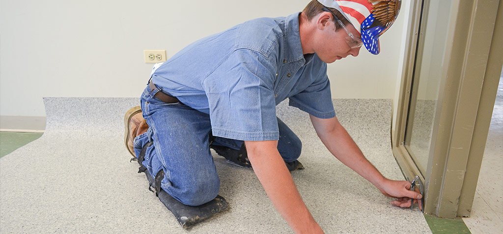 Flooring Installer Working with Resilient