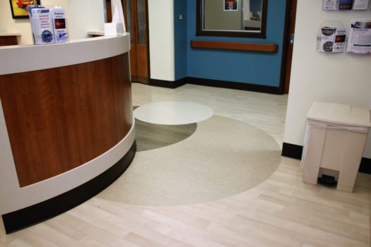 United States Department of Veterans Affairs NIHCS Fort Wayne Campus front desk detail flooring installation project by INSTALL